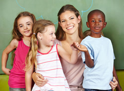 Day care teacher with children